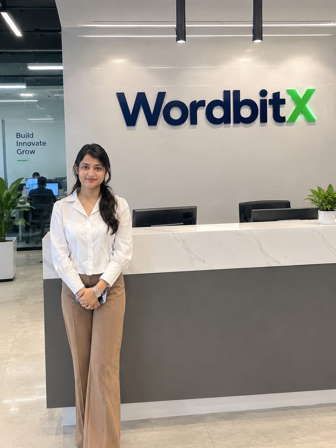 WordbitX studio, Lahore — reception with the WordbitX brand wall