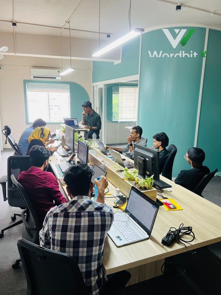 WordbitX engineering team collaborating on a client project